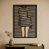 7. Striped Silhouette Metal Wall Art