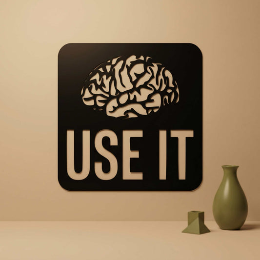 1. Use It Brain Metal Wall Art